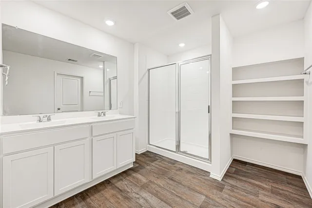 a view of a room with racks on the wall