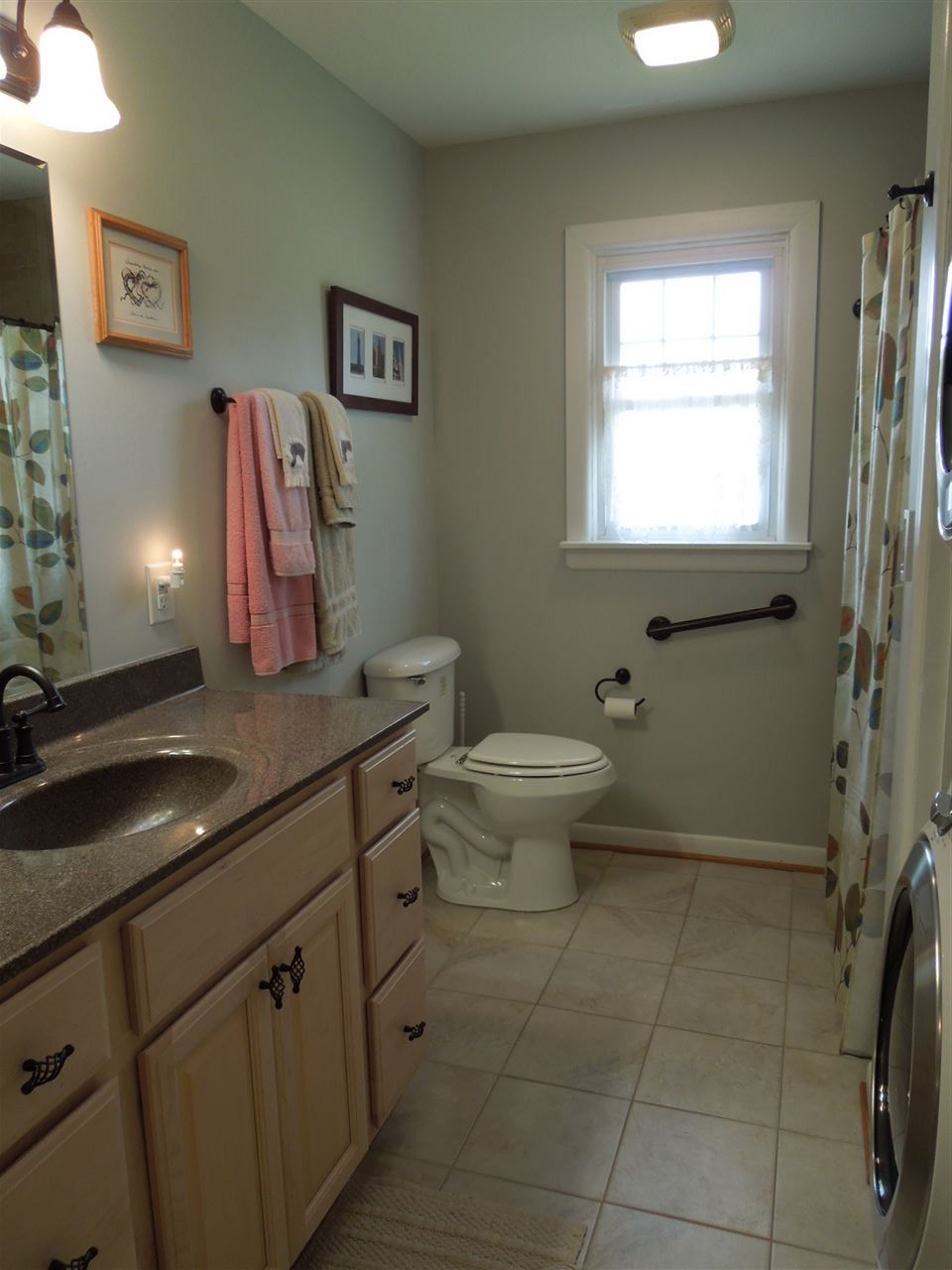 704 Union Church Road Churchville, VA 24421 - Photo 13 of 28 a bathroom with a granite countertop sink a toilet and a mirror