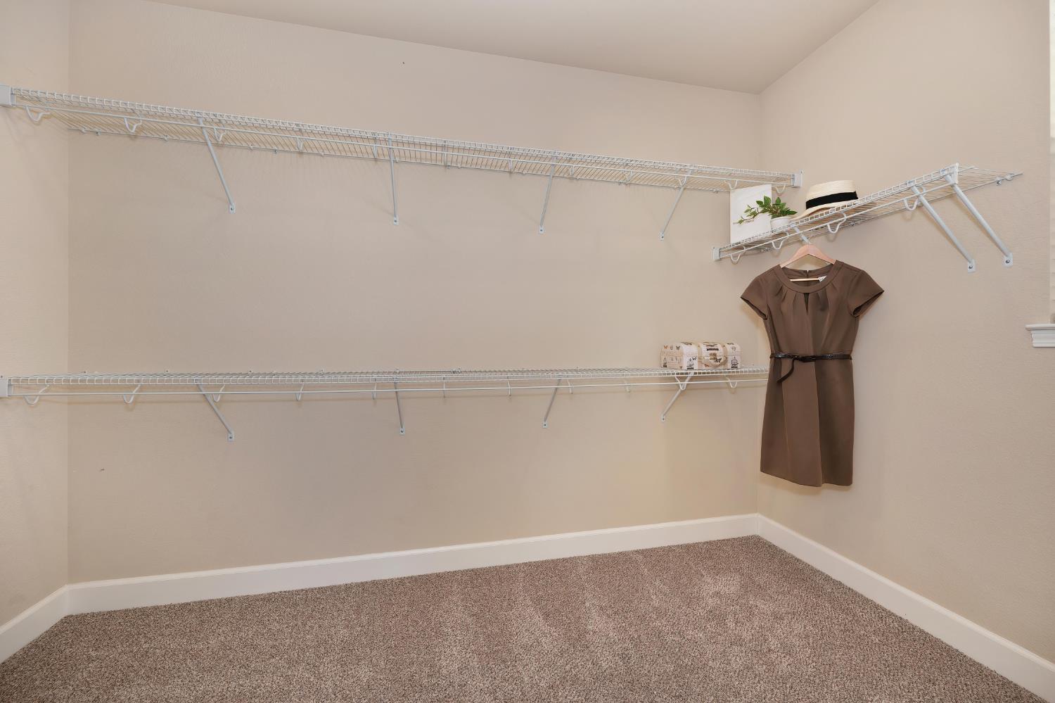 908 Lyon Place Roseville, CA 95747 - Photo 27 of 32 a view of a room with racks on the wall
