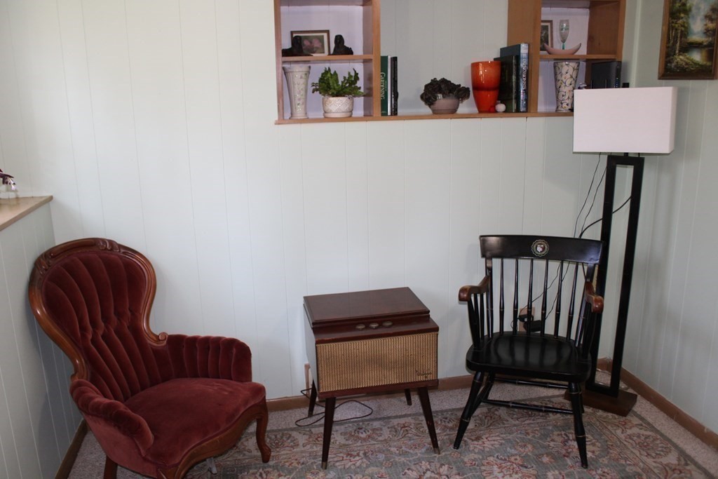 295 Draper Street Springfield, MA 01108 - Photo 13 of 31 a view of a workspace with furniture and a window