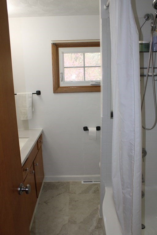 295 Draper Street Springfield, MA 01108 - Photo 23 of 31 a bathroom with a sink and toilet