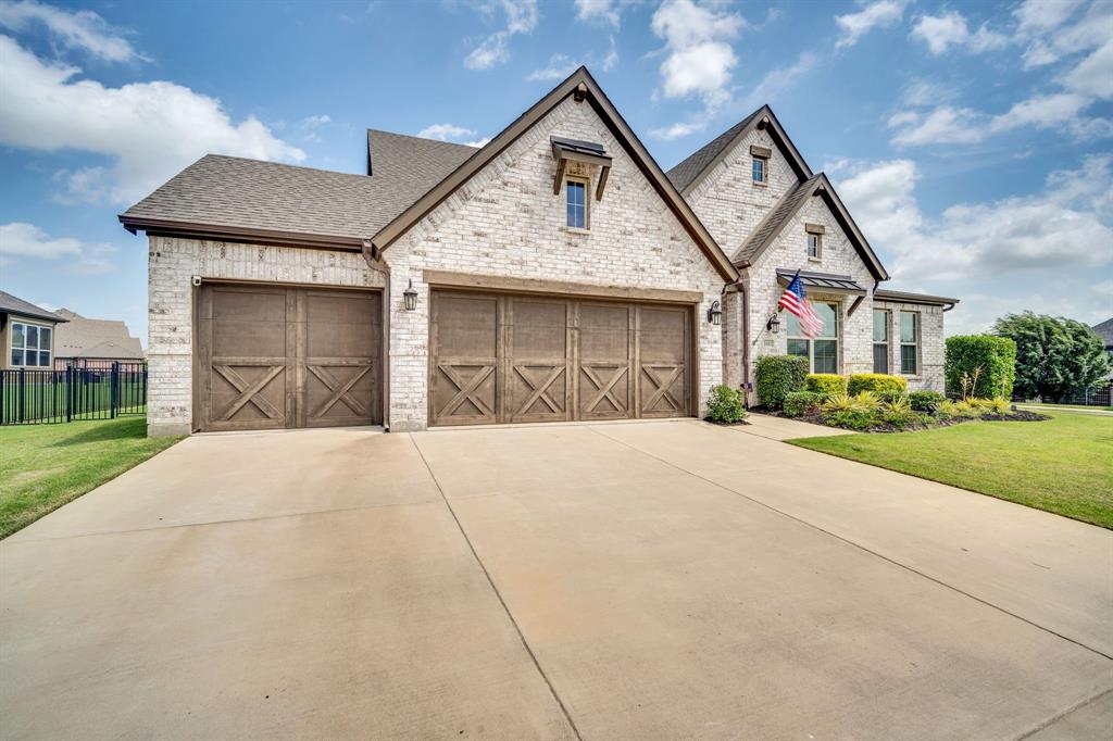 1601 Bear Path Way Gunter, TX 75058 - Photo 8 of 40 a front view of a house with garden