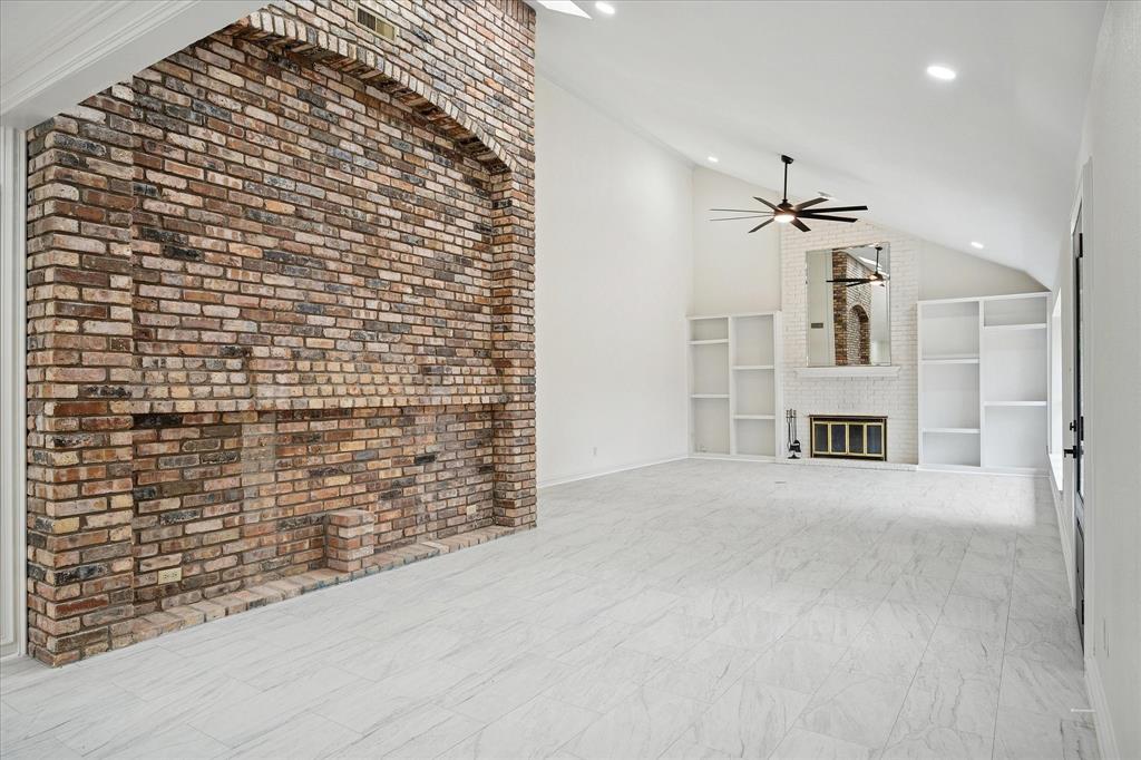62 Legend Road Benbrook, TX 76132 - Photo 5 of 27 Beautiful brick wall adds a decorative accent as you enter this inviting home.