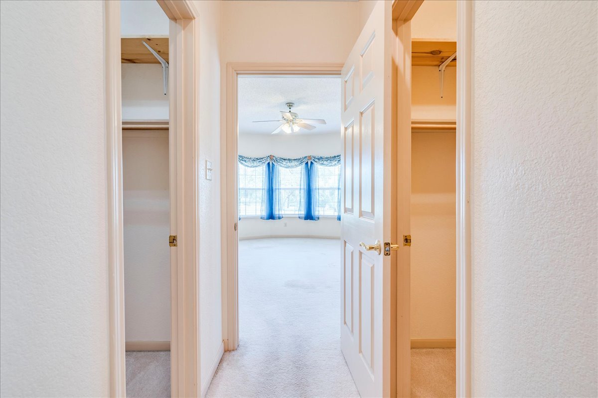 19106 Eyerley Road Manor, TX 78653 - Photo 17 of 40 Double walk-in closets in primary bedroom