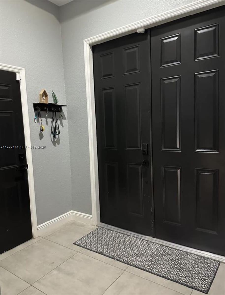 27862 Southwest 134th Court Homestead, FL 33033 - Photo 2 of 14 a view of entryway