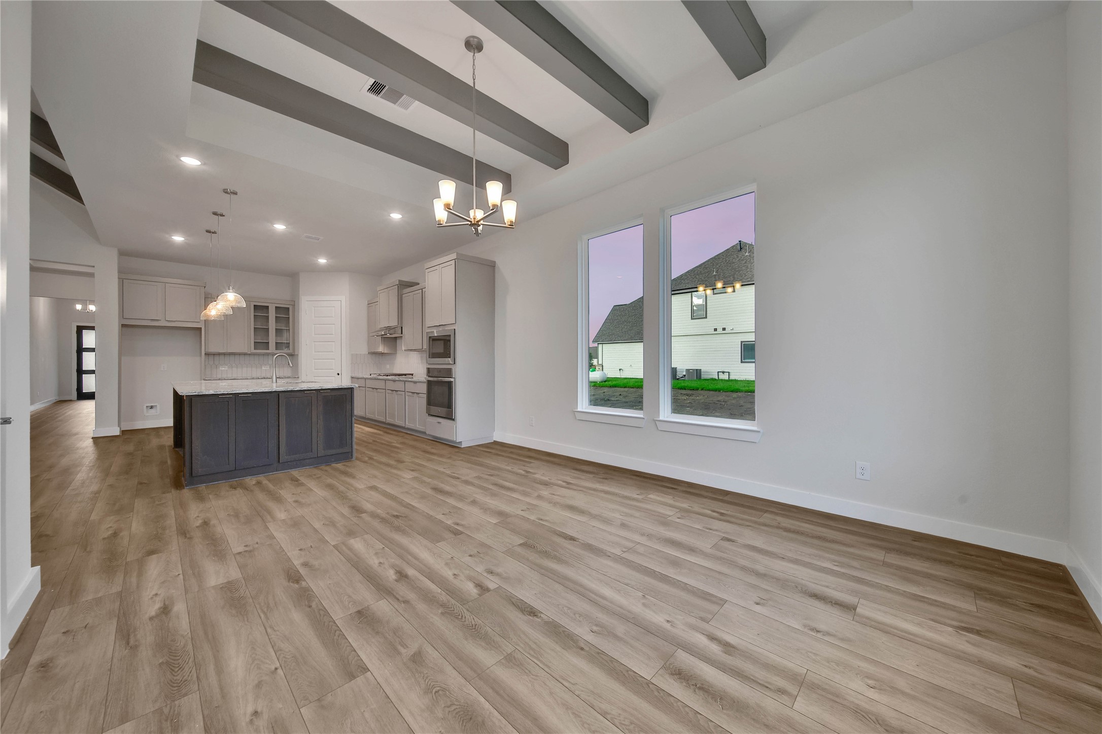 4602 Magnolia Bend Drive Rosharon, TX 77583 - Photo 12 of 39 a view of kitchen with kitchen island wooden floor center island and stainless steel appliances