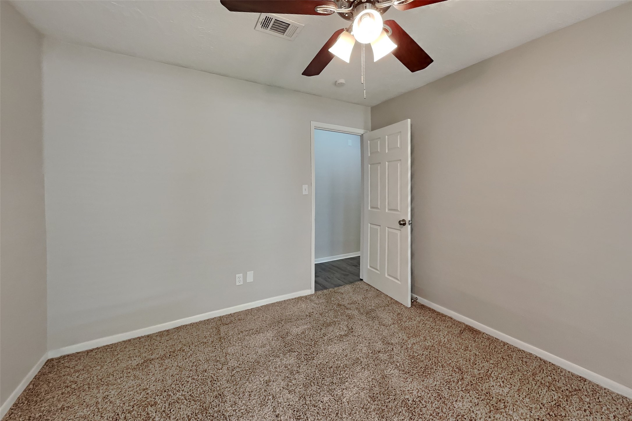 29307 Atherstone Street Spring, TX 77386 - Photo 16 of 22 an empty room with chandelier fan