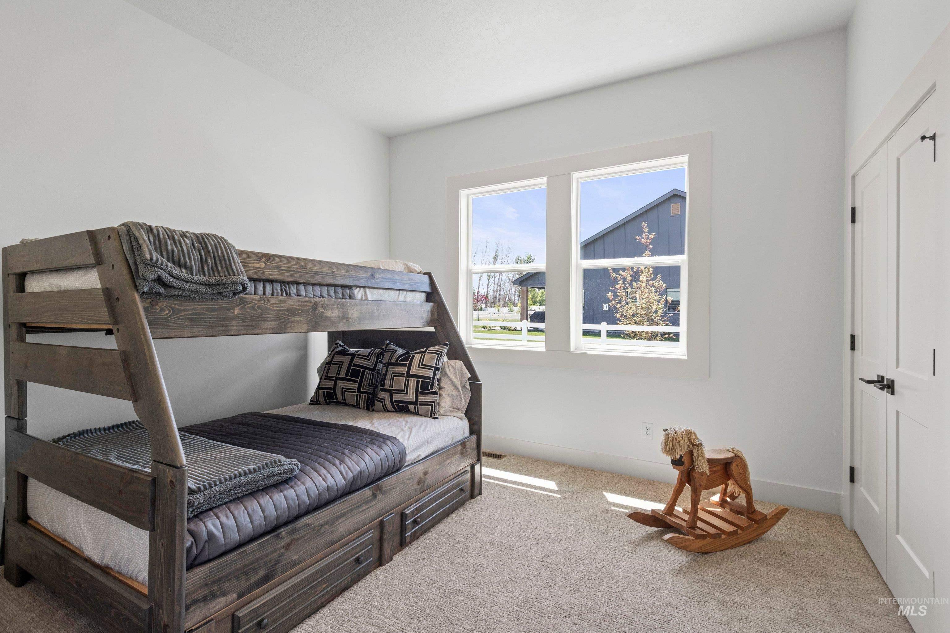 24990 Belgian Way Middleton, ID 83644 - Photo 31 of 50 Bedroom featuring neutral-toned carpeting and white walls