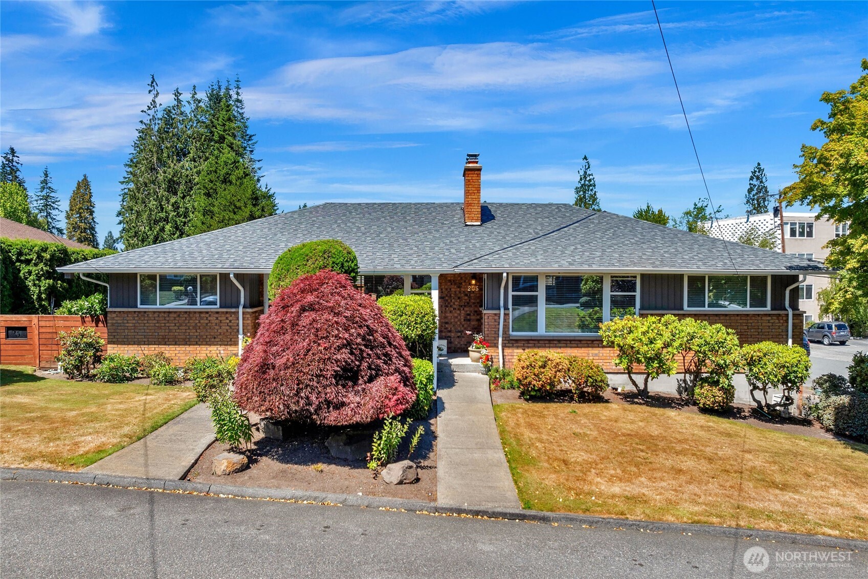 205 Heather Road Everett, WA 98203 - Photo 1 of 40 a front view of a house with a yard