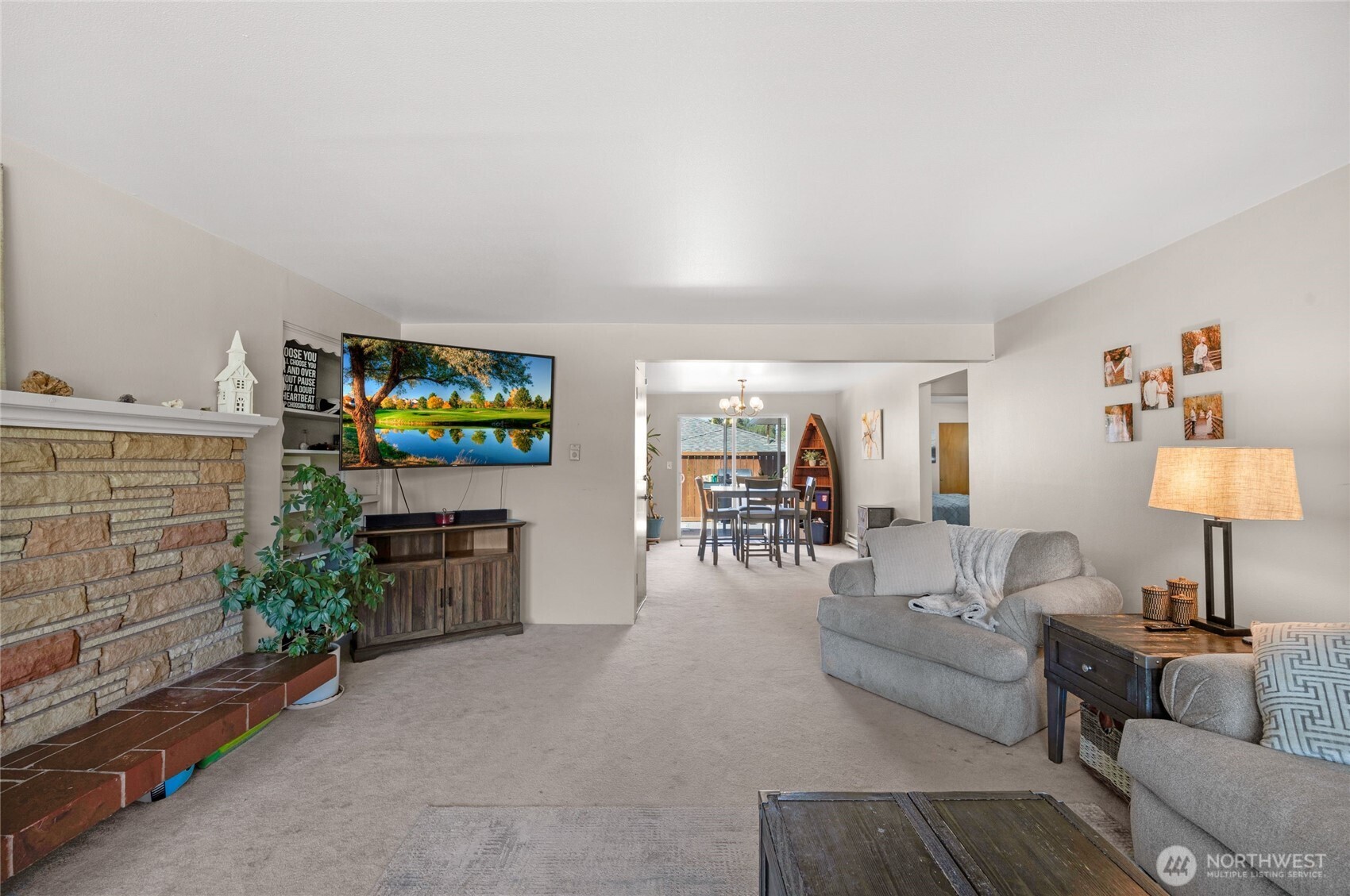 205 Heather Road Everett, WA 98203 - Photo 29 of 40 a living room with furniture and a flat screen tv