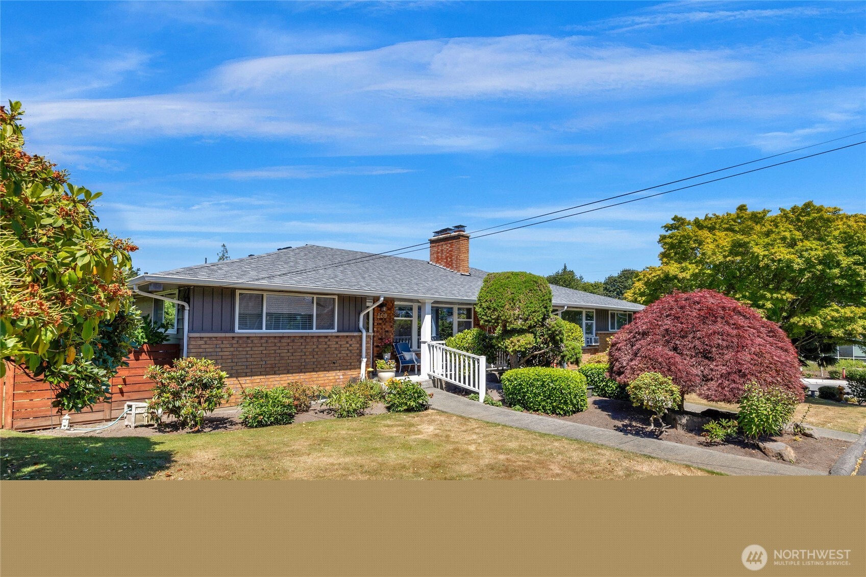 205 Heather Road Everett, WA 98203 - Photo 3 of 40 a front view of house with yard and green space