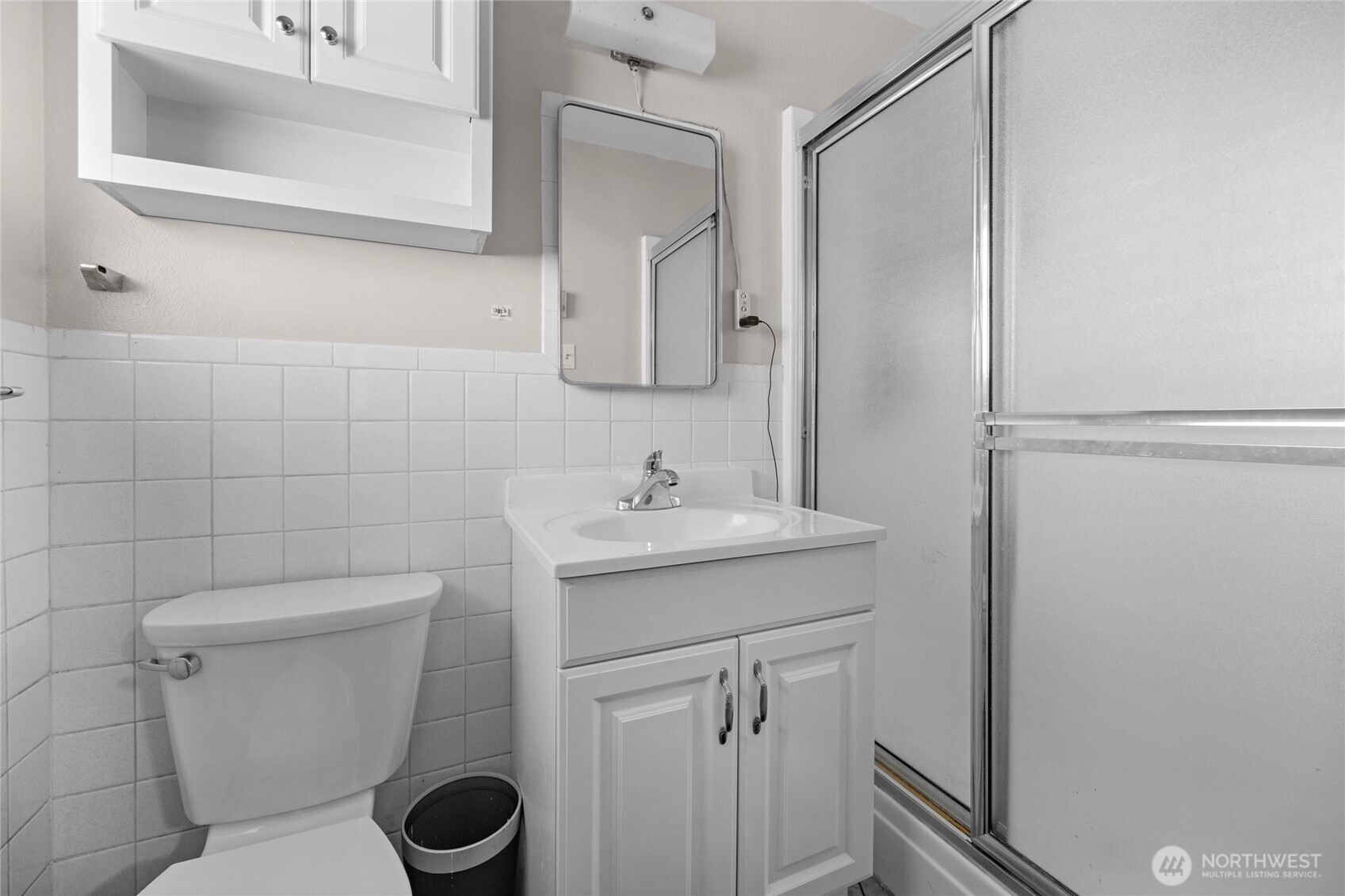 205 Heather Road Everett, WA 98203 - Photo 35 of 40 a bathroom with a toilet sink and mirror