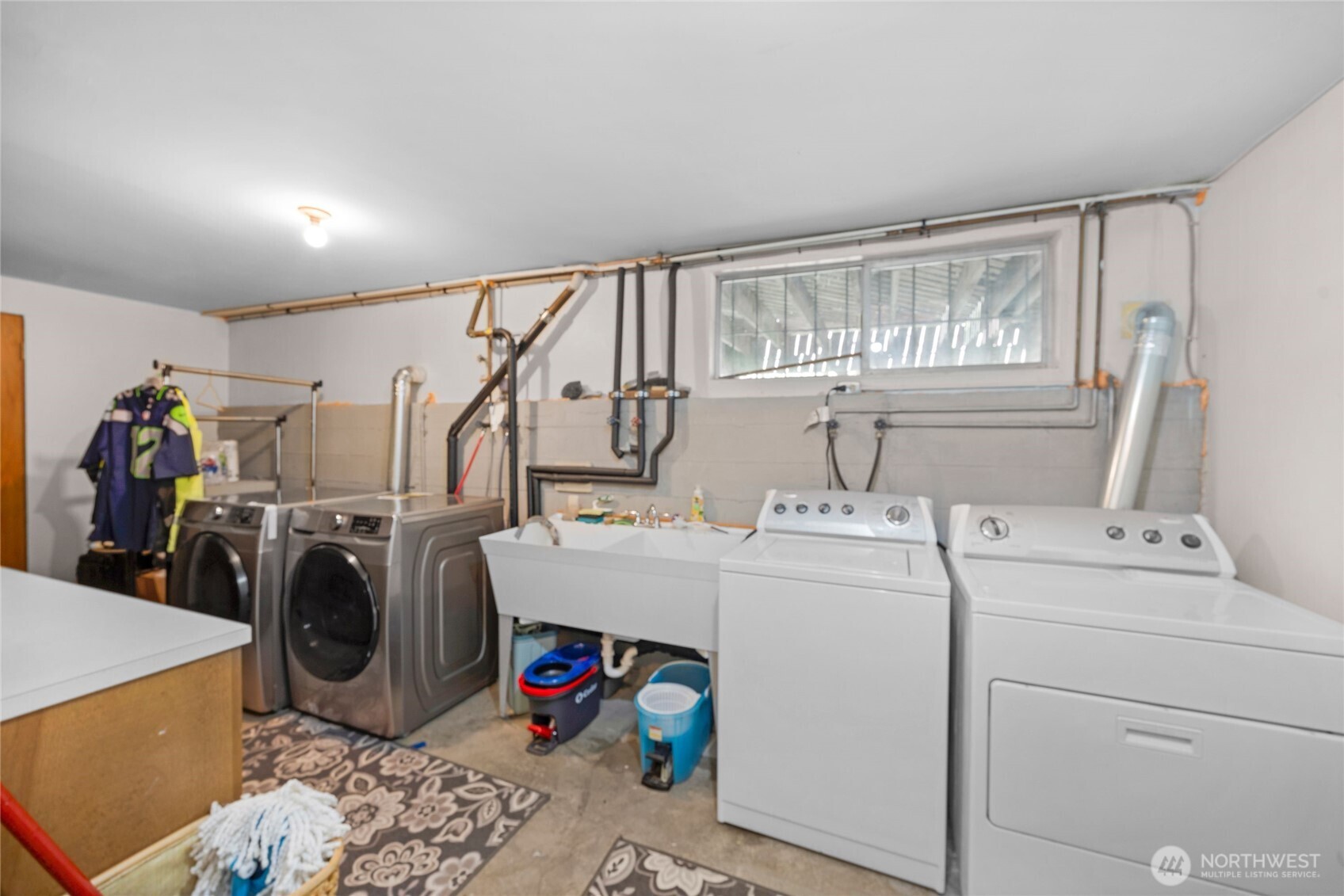 205 Heather Road Everett, WA 98203 - Photo 38 of 40 a view of storage and utility room with washer and dryer