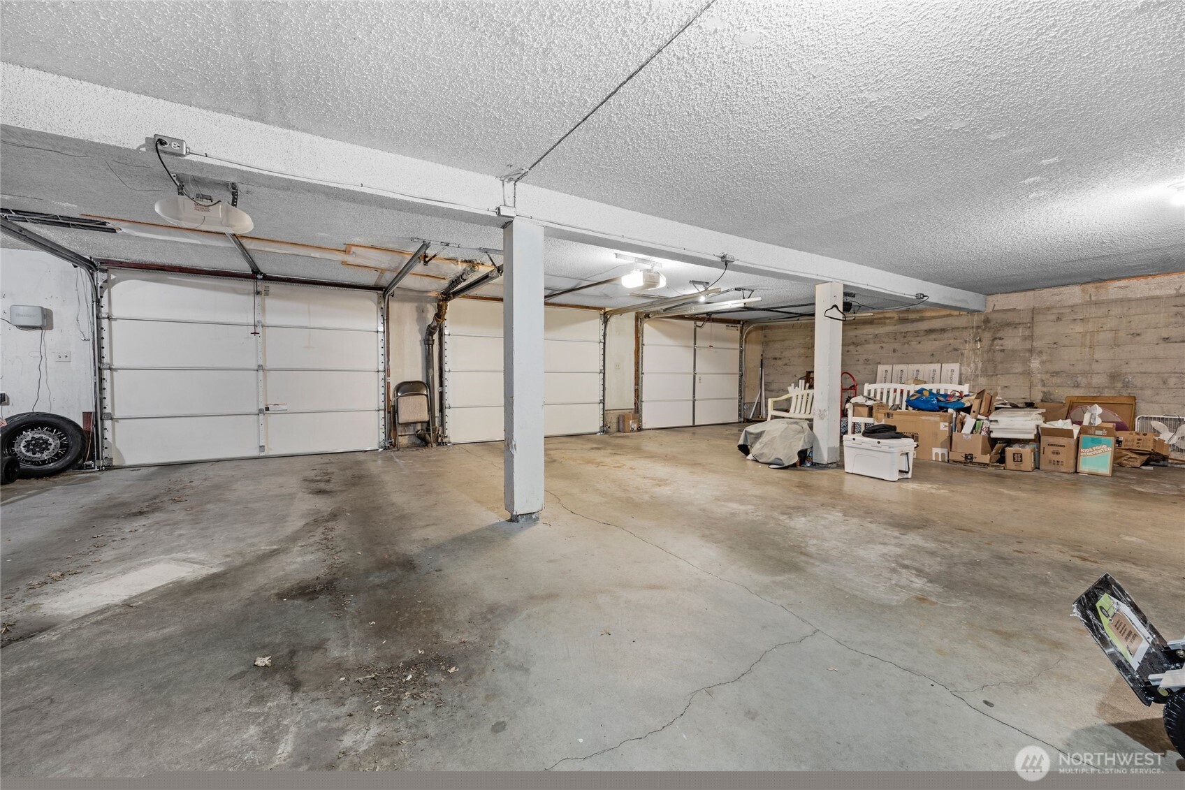 205 Heather Road Everett, WA 98203 - Photo 39 of 40 a view of parking garage with cars