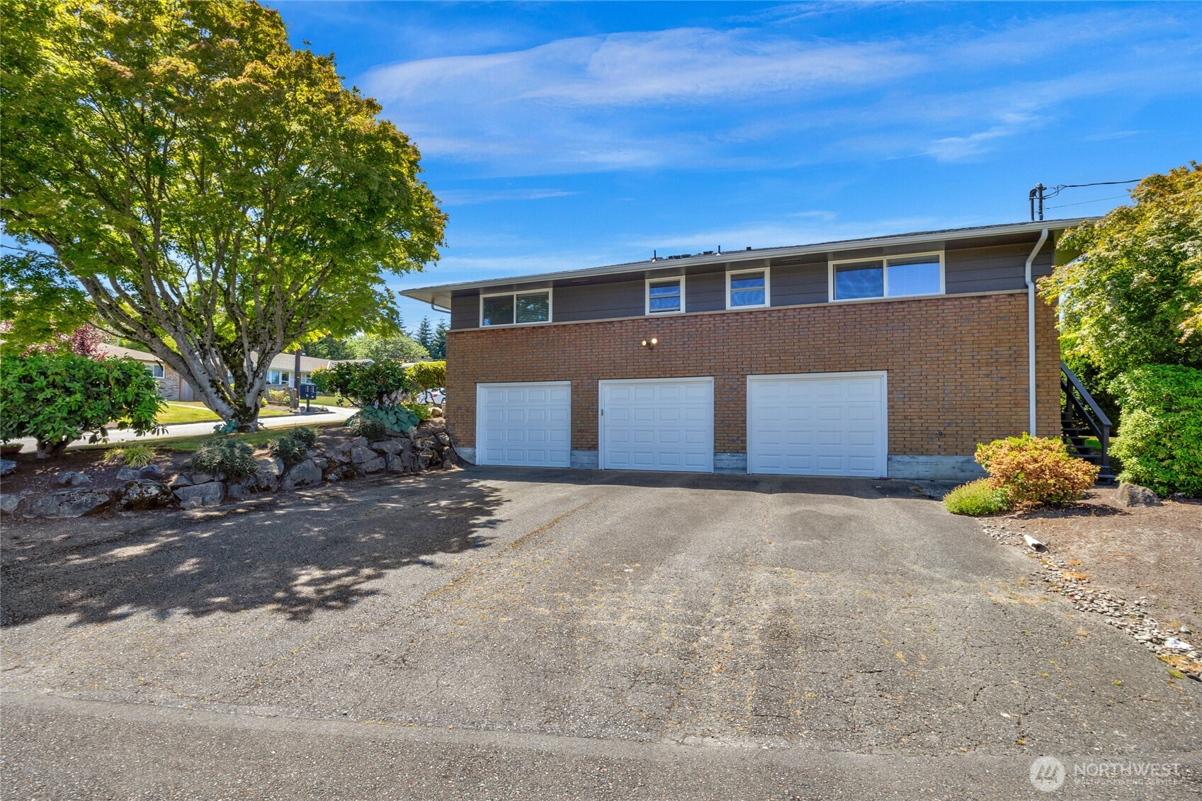 205 Heather Road Everett, WA 98203 - Photo 4 of 40 a front view of a house with a yard