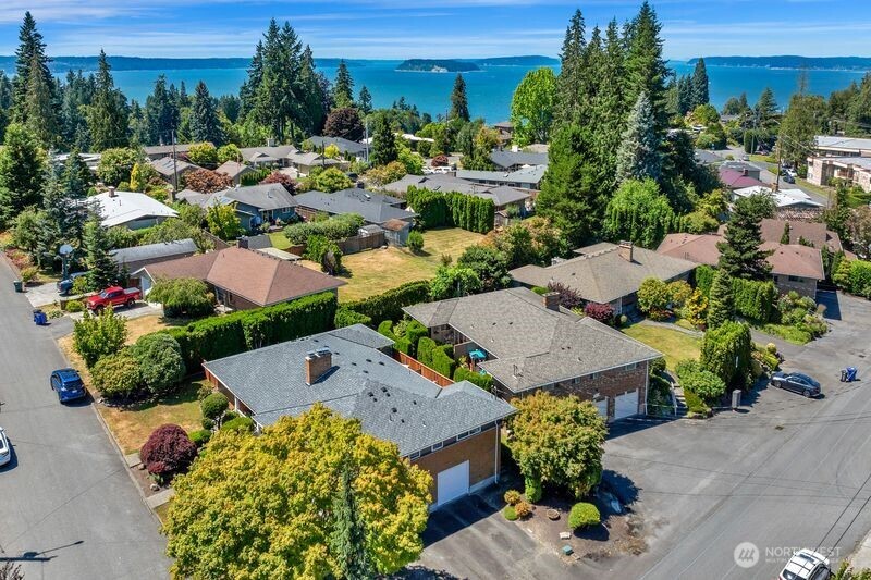 205 Heather Road Everett, WA 98203 - Photo 7 of 40 an aerial view of multiple houses with yard