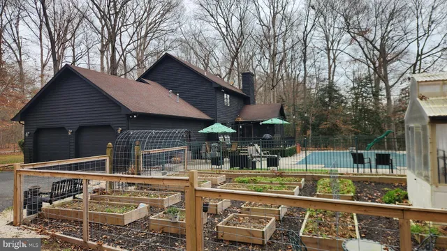 a view of house with outdoor space