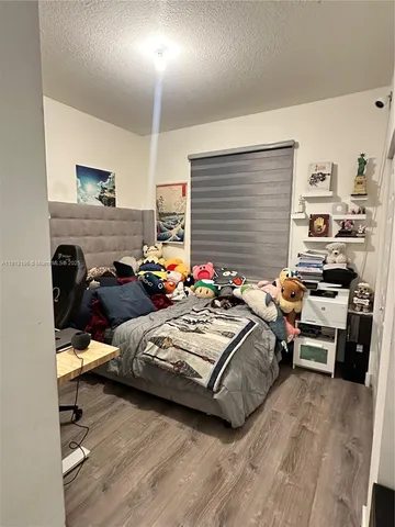 a utility room with cabinets and washer