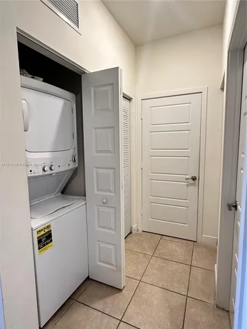 a bathroom with a sink toilet and mirror