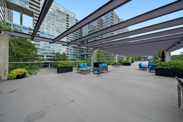 a view of the street with furniture