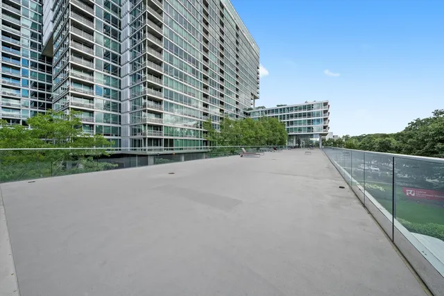 a view of a building with a street