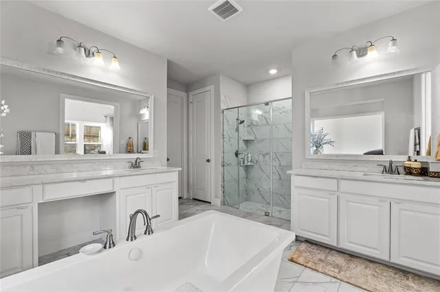 a view of a dining room with furniture a rug and wooden floor