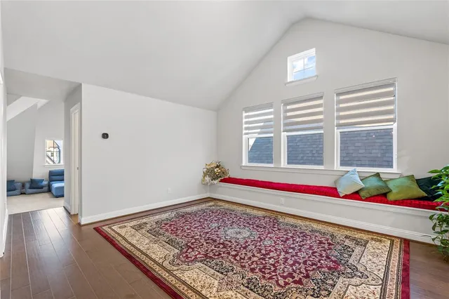 an aerial view of residential building and ocean