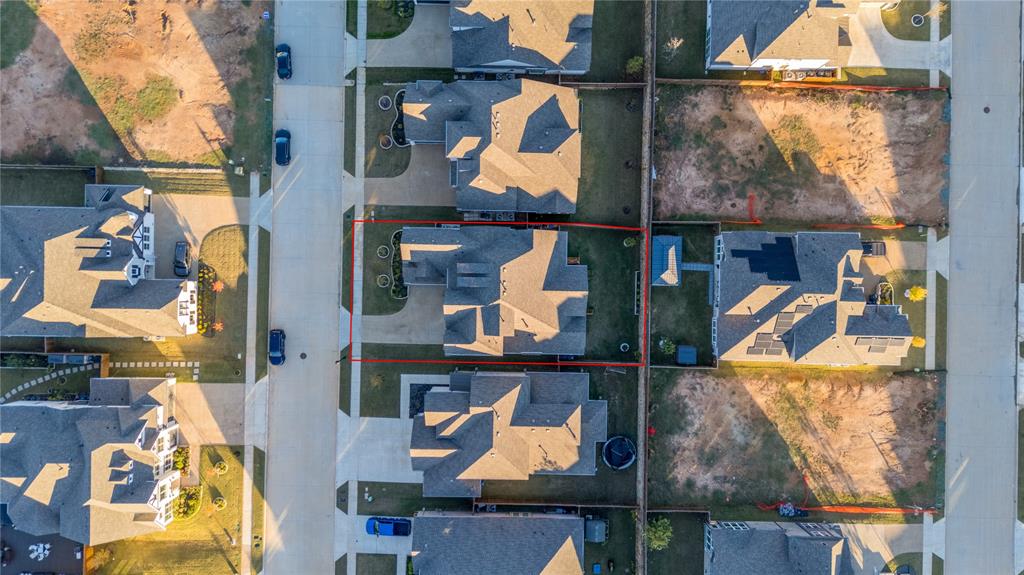3516 Ithaca Street Corinth, TX 76208 - Photo 35 of 40 an aerial view of houses and roads