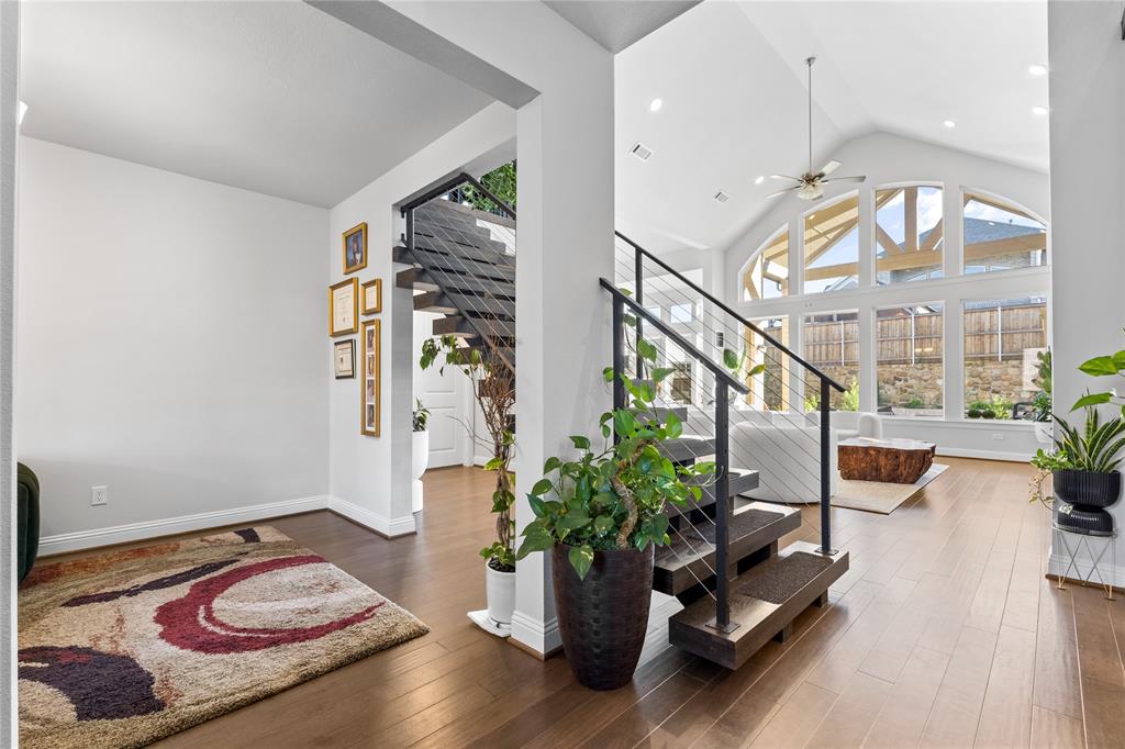 3516 Ithaca Street Corinth, TX 76208 - Photo 7 of 40 a living room with furniture and a potted plant