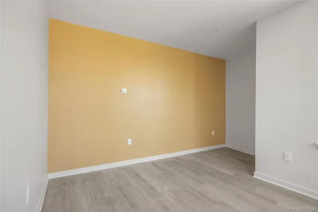 a view of a big room with wooden floor