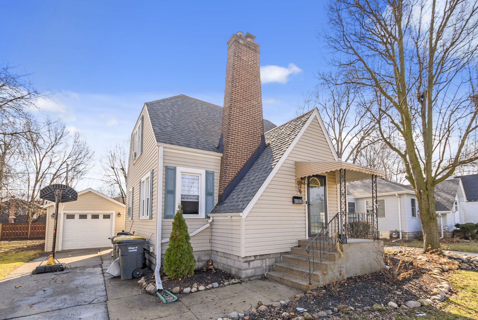 a front view of a house with garden