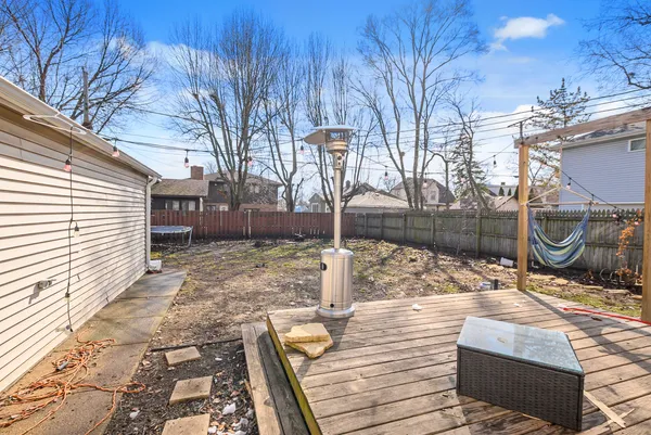 a view of a backyard of the house