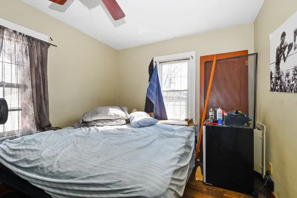 a room with a bed and a window