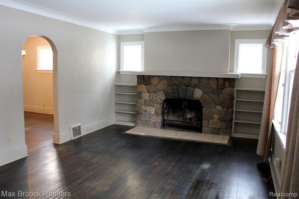 Living Room w/ Stone Fireplace