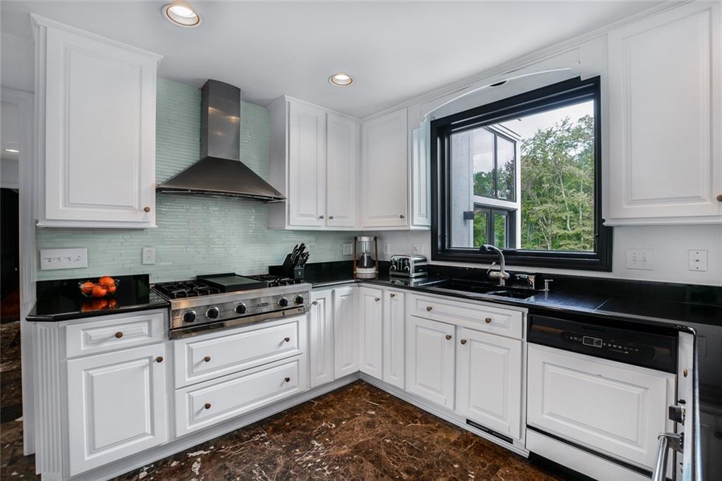 450 McKinney Road Wexford, PA 15090 - Photo 13 of 25 Kitchen sports Viking cook top and oven, new back splash, updated cabinets and more!