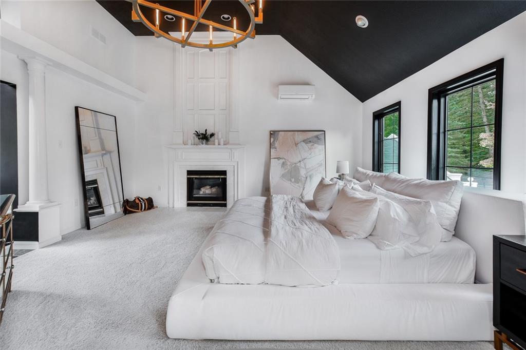 450 McKinney Road Wexford, PA 15090 - Photo 16 of 25 Spacious Master bedroom sports its own charming fireplace and volume ceiling!