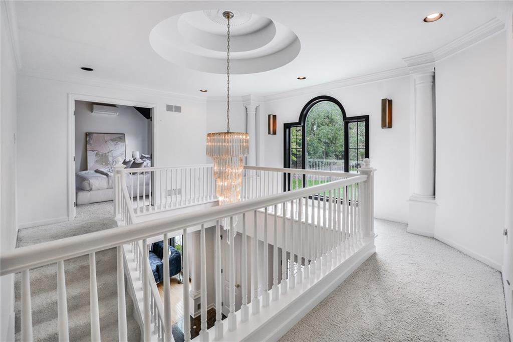 450 McKinney Road Wexford, PA 15090 - Photo 20 of 25 Upstairs landing is adorned with chandelier and picturesque window!