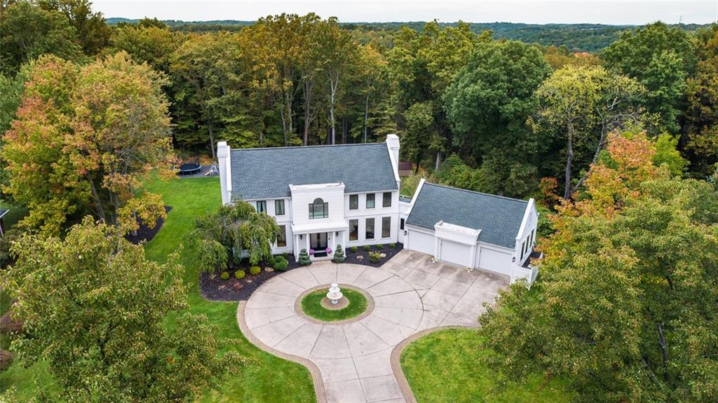 450 McKinney Road Wexford, PA 15090 - Photo 3 of 25 This charming home is nestled in a picturesque setting but is only minutes away from North Park, the Wexford flats, Whole Foods and much more!