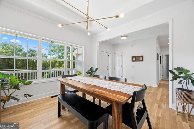 a kitchen with a table and chairs