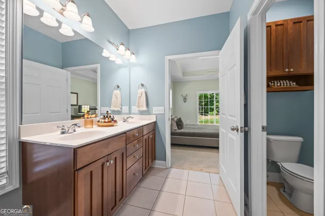 a spacious bedroom with a bed and a table