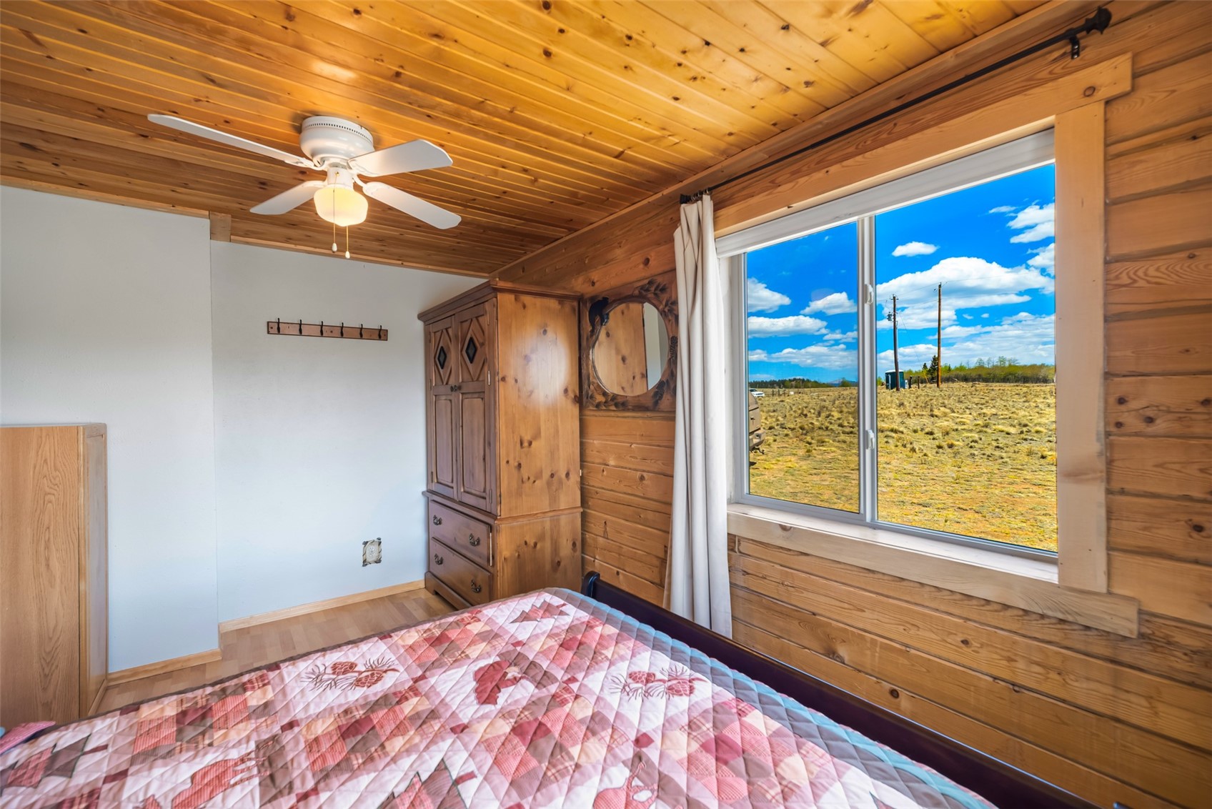 15 Mallard Road Como, CO 80432 - Photo 44 of 49 a bedroom with a bed and a window