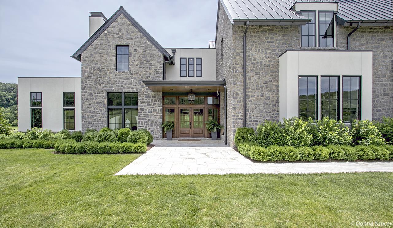 5747 Garrison Road Franklin, TN 37064 - Photo 2 of 30 a front view of a house with garden