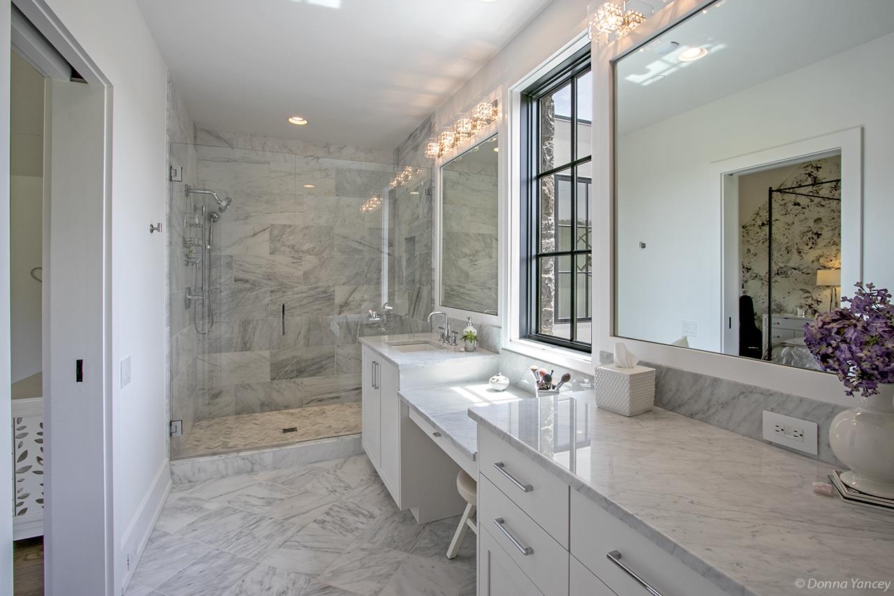 5747 Garrison Road Franklin, TN 37064 - Photo 21 of 30 a spacious bathroom with a granite countertop sink a toilet a mirror and shower