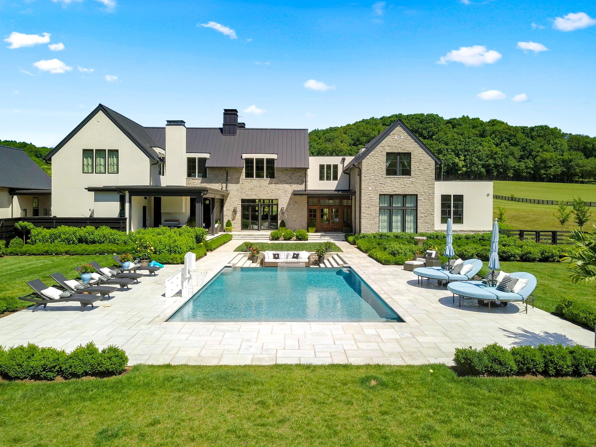 5747 Garrison Road Franklin, TN 37064 - Photo 26 of 30 a front view of a house with garden