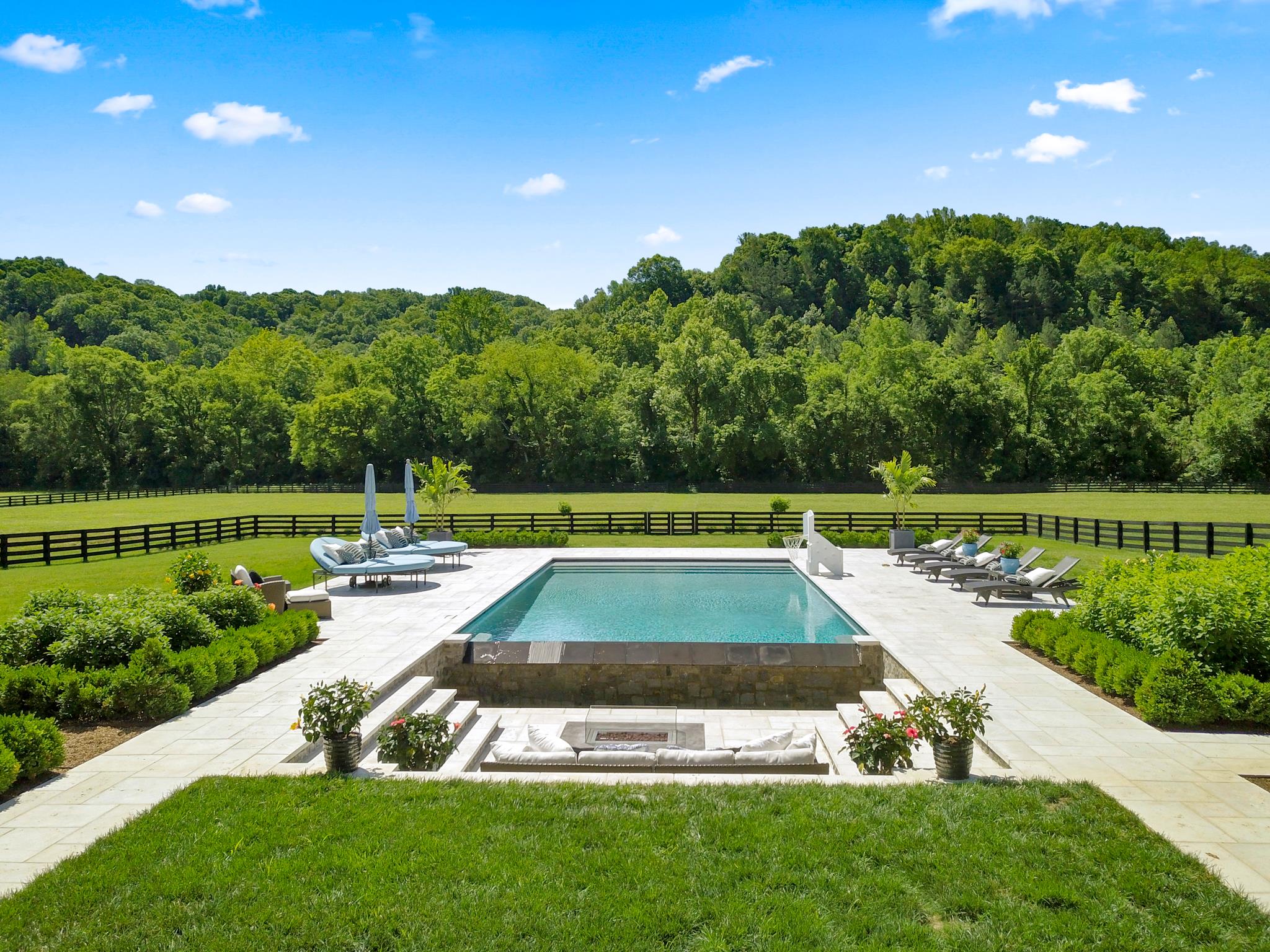 5747 Garrison Road Franklin, TN 37064 - Photo 27 of 30 a view of yard with swimming pool and outdoor seating