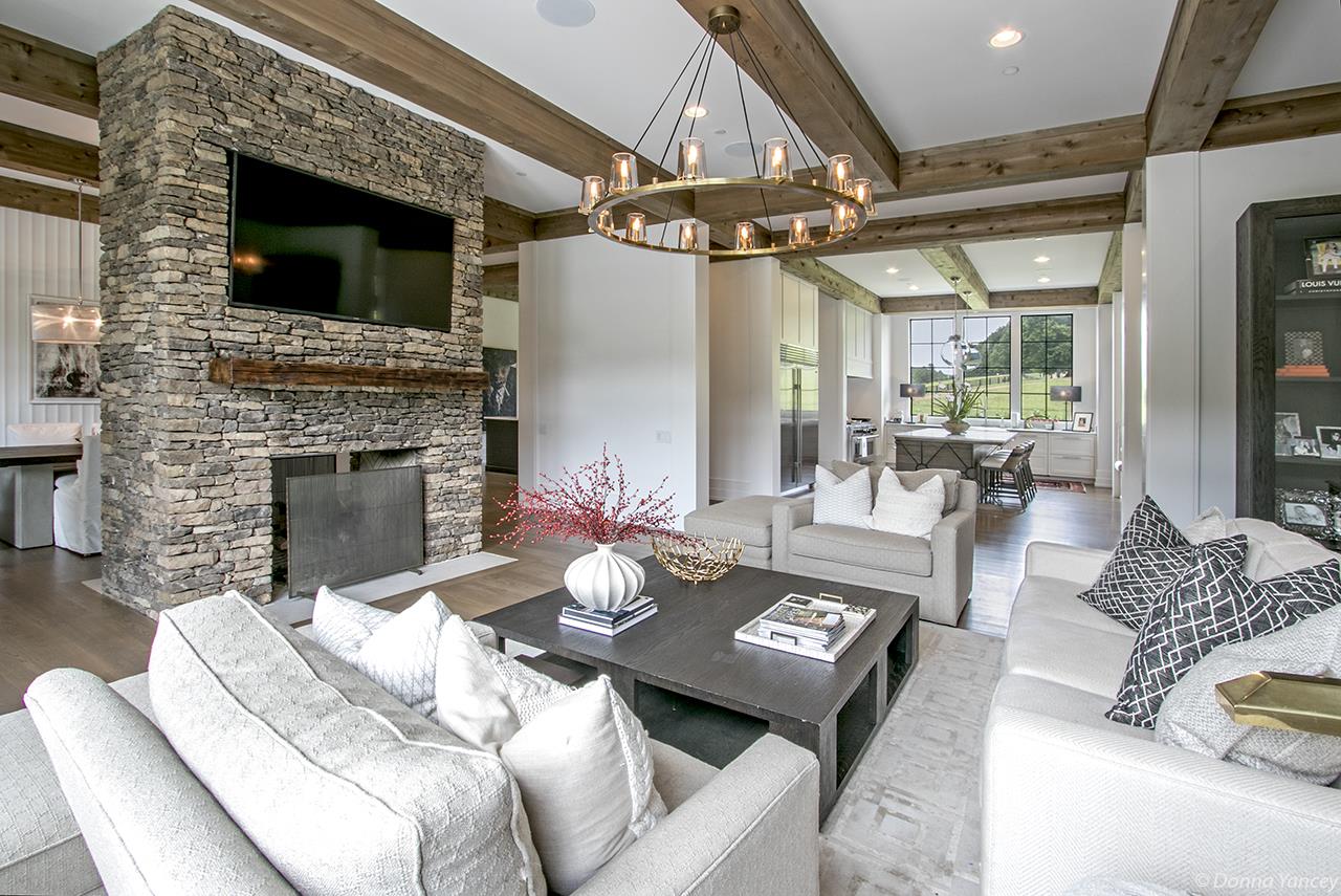 5747 Garrison Road Franklin, TN 37064 - Photo 7 of 30 a living room with furniture and a fireplace