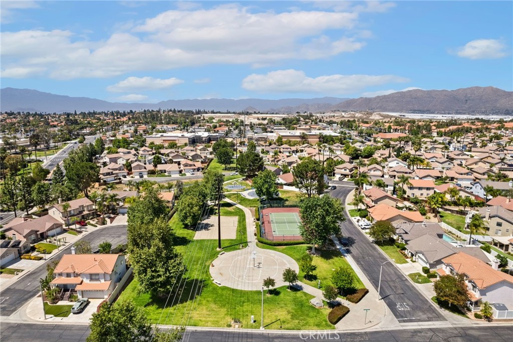 7615 Canberra Way Riverside, CA 92508 - Photo 2 of 37 an aerial view of residential houses and outdoor space