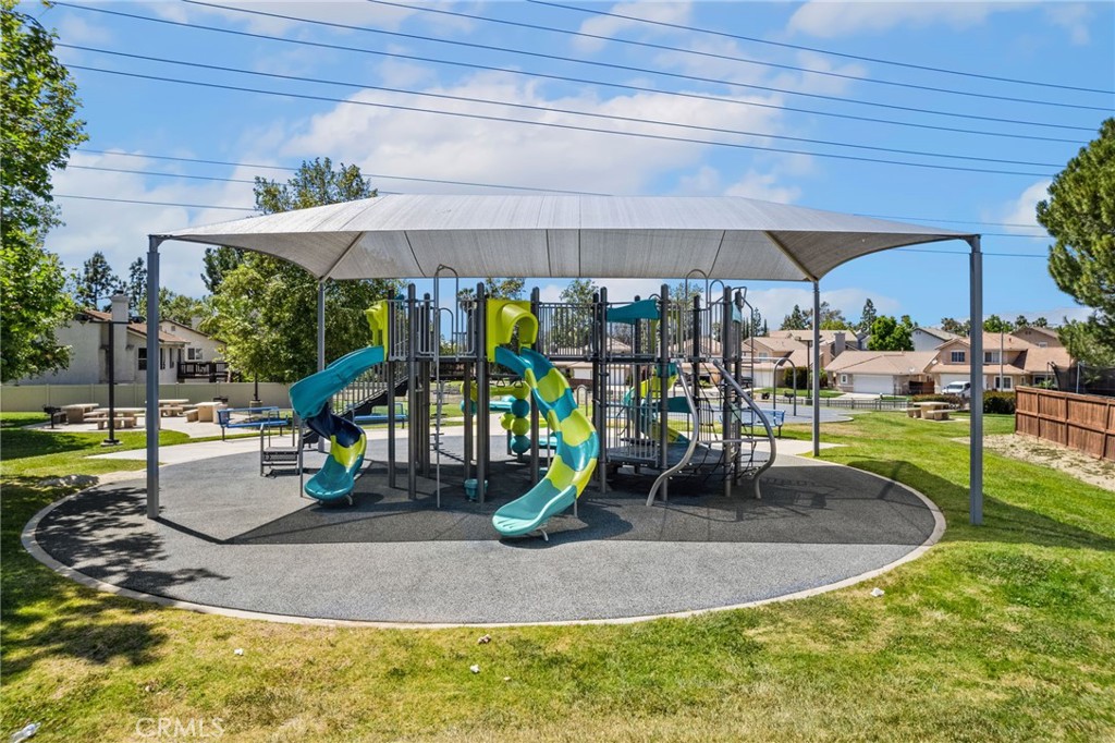 7615 Canberra Way Riverside, CA 92508 - Photo 34 of 37 a view of a swimming pool with a patio