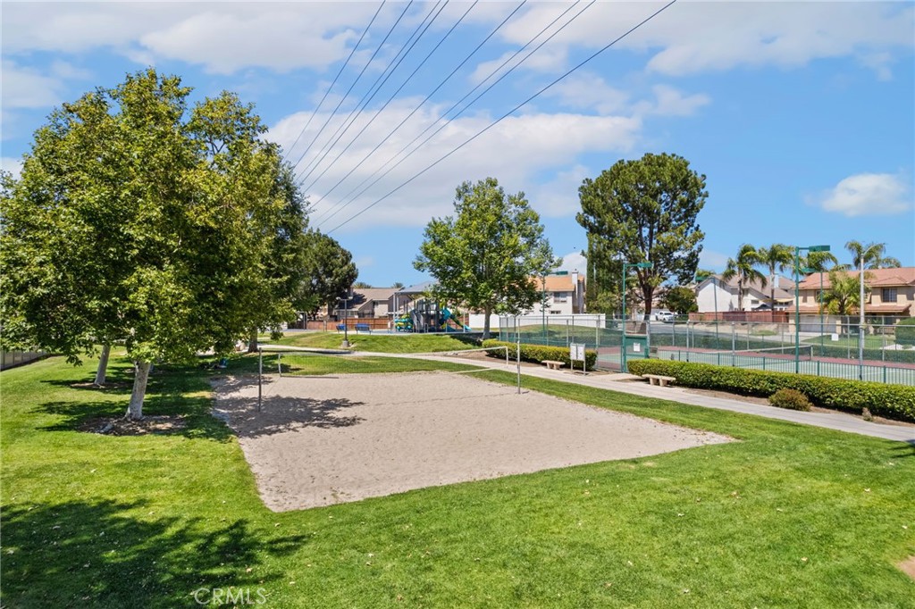 7615 Canberra Way Riverside, CA 92508 - Photo 36 of 37 a view of a swimming pool and a yard
