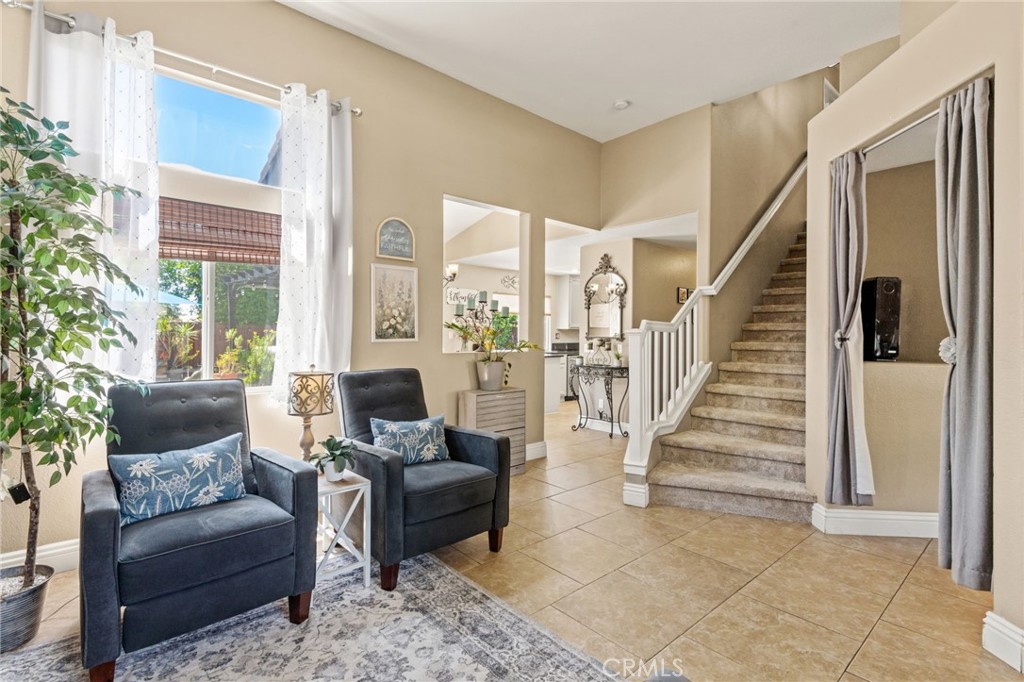 7615 Canberra Way Riverside, CA 92508 - Photo 5 of 37 a living room with furniture and windows